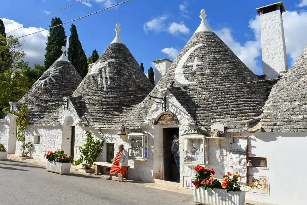 Alberobello, Italy, Europe: Unique whitewashed trulli houses with conical roofs in the historic town of Alberobello.