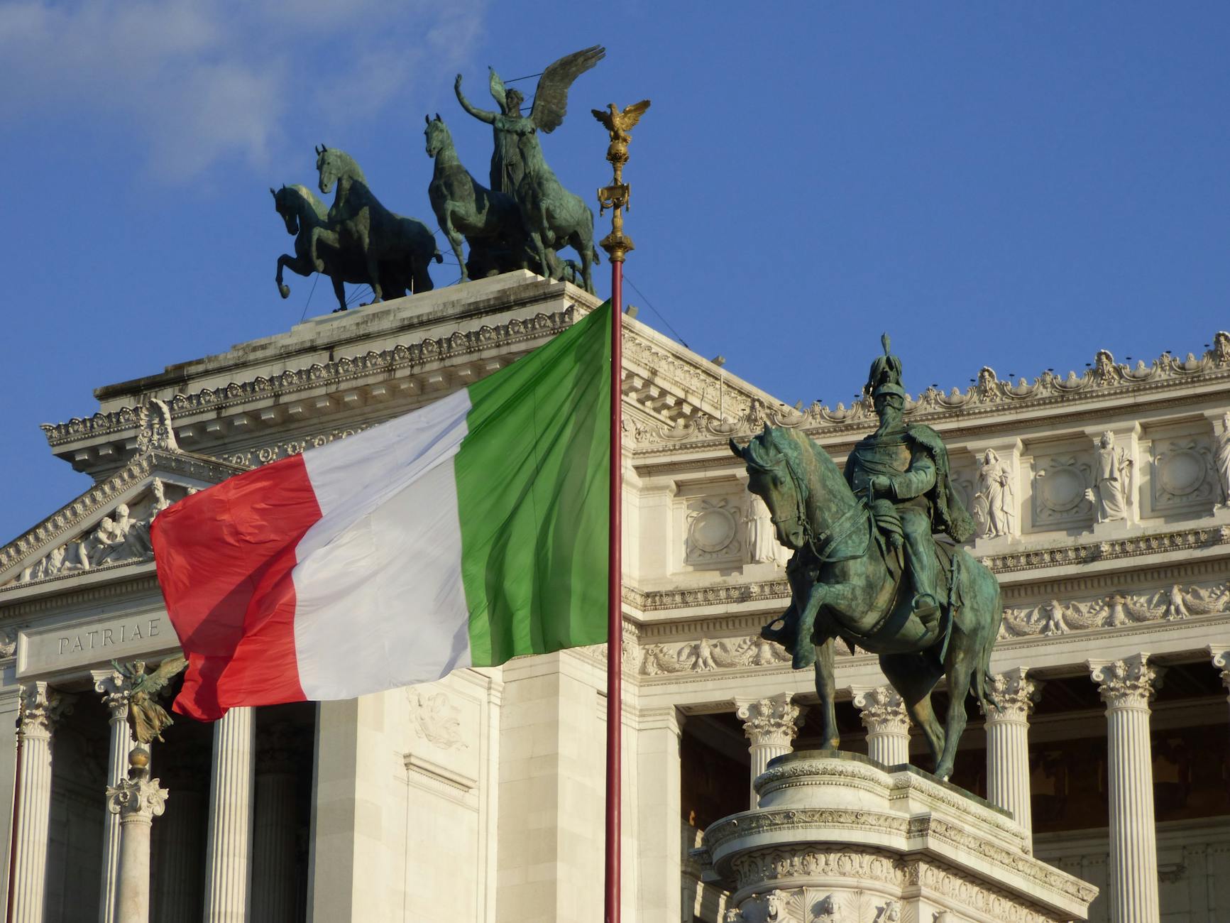 italian flag at altare della patria in rome