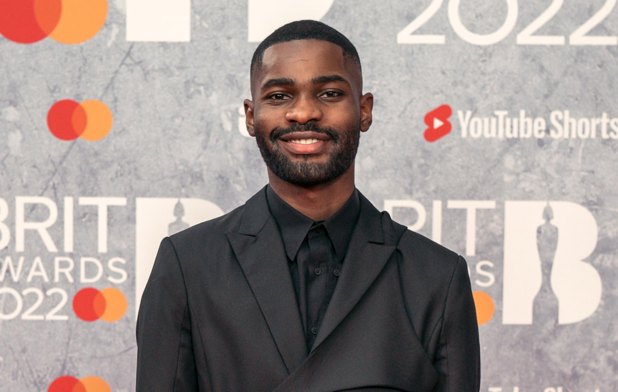 dave britawards redcarpet black suit 2000x1270 1