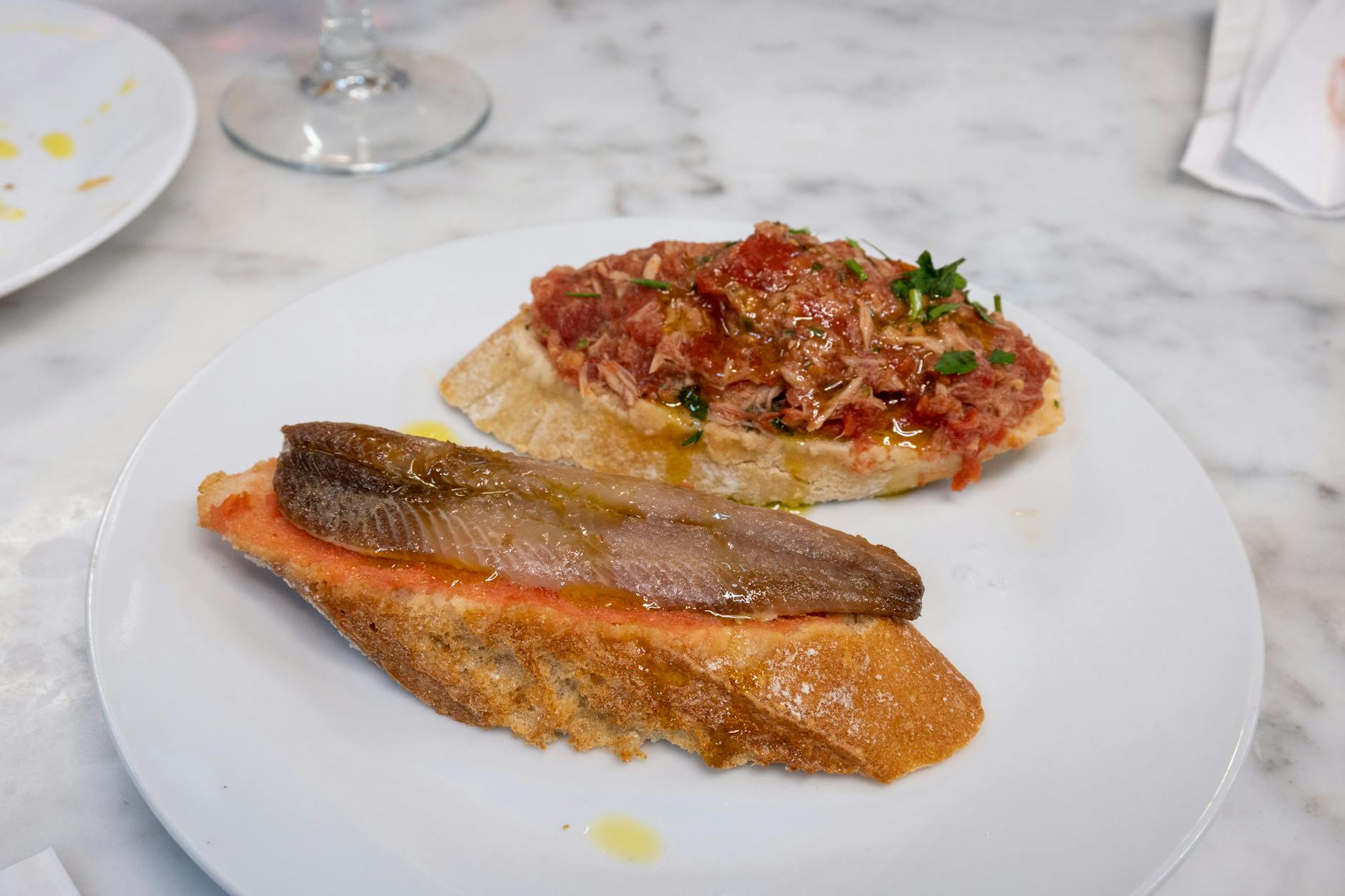 delicious tapas on marble table in spain