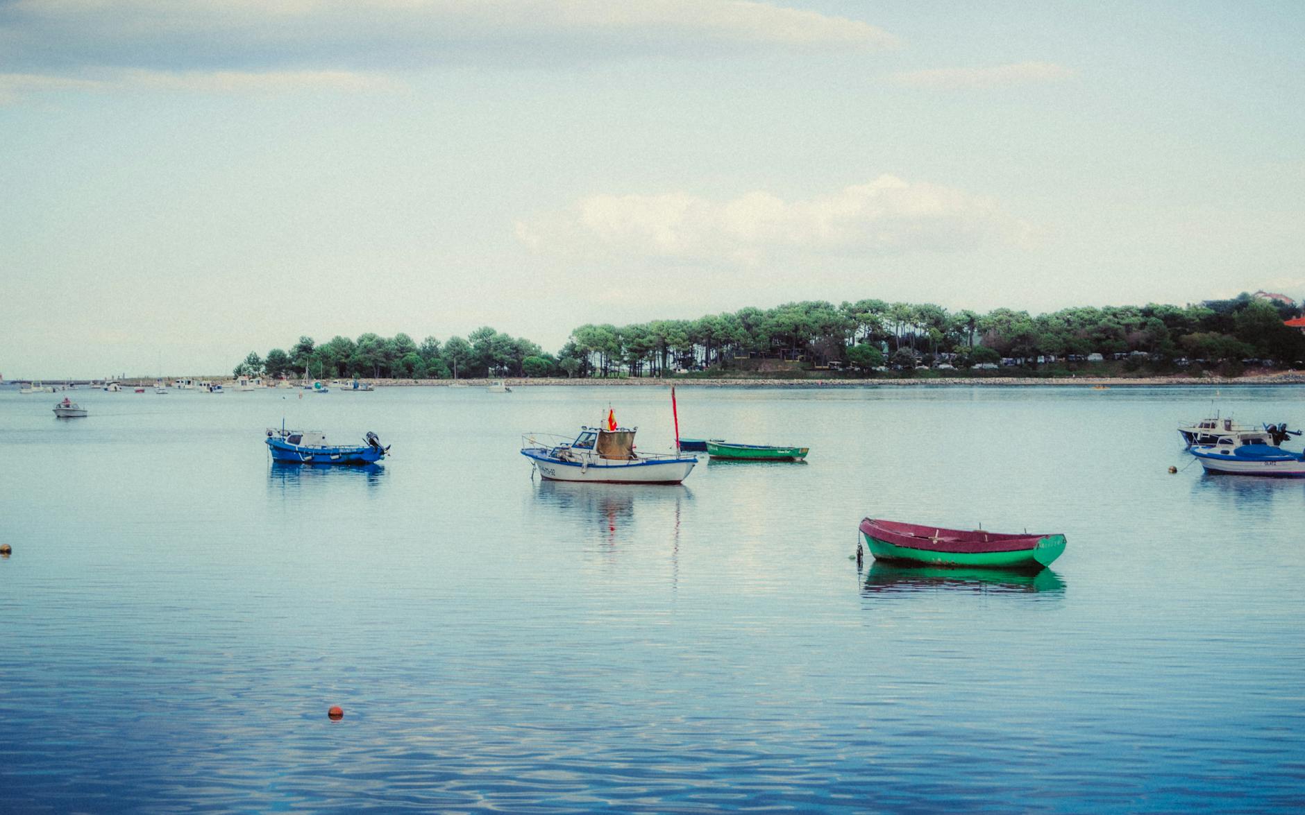 serene boats on tranquil asturias waters, We have some Asturias Travel idea for you