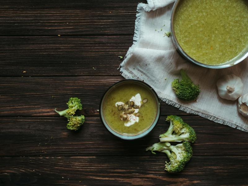 green broccoli and white rice on white ceramic bowl
