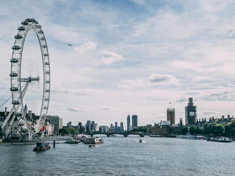 ferris wheel beside body of water