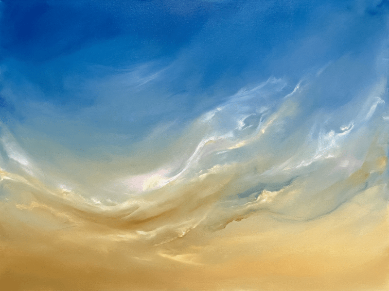 Sky showing gradient from golden to blue with wispy clouds